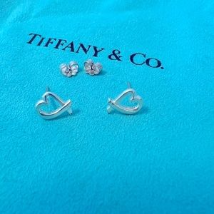 Tiffany and Co. Paloma Picasso loving heart earrings.